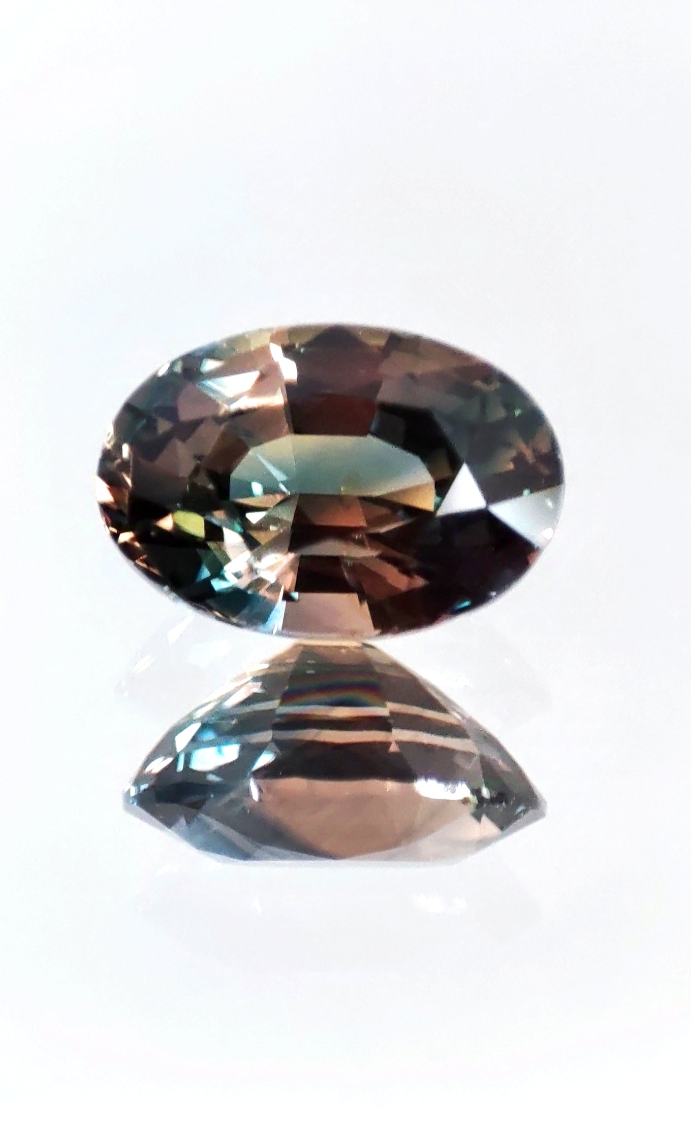 The Earth's Masterpiece: A Captivating 2.09ct Bi-Color Sapphire