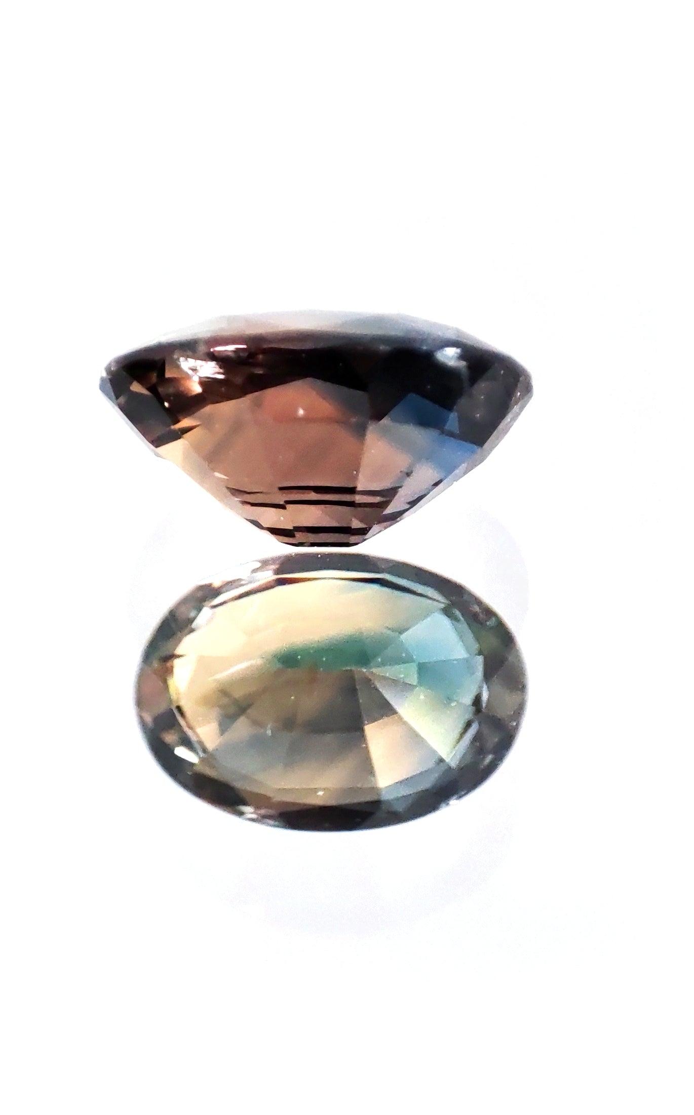 The Earth's Masterpiece: A Captivating 2.09ct Bi-Color Sapphire
