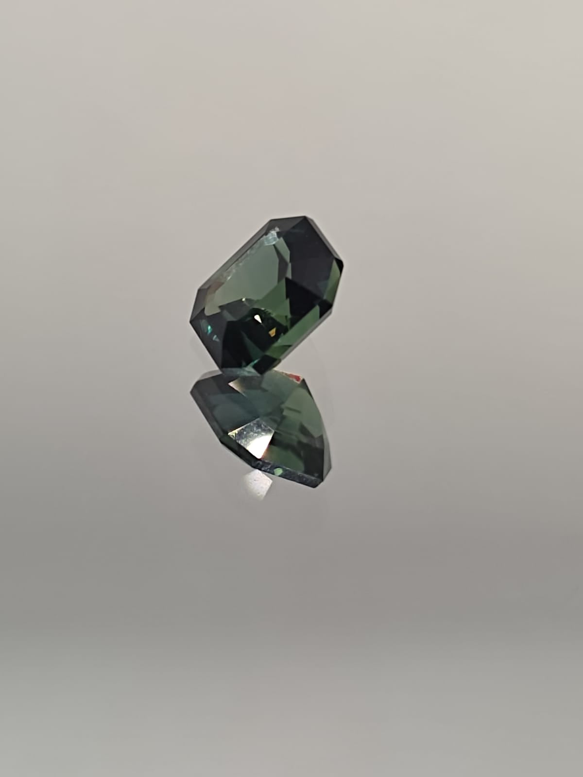 The Enchanting 1.60-Carat Teal Sapphire: A Gem of Elegance and Mystery