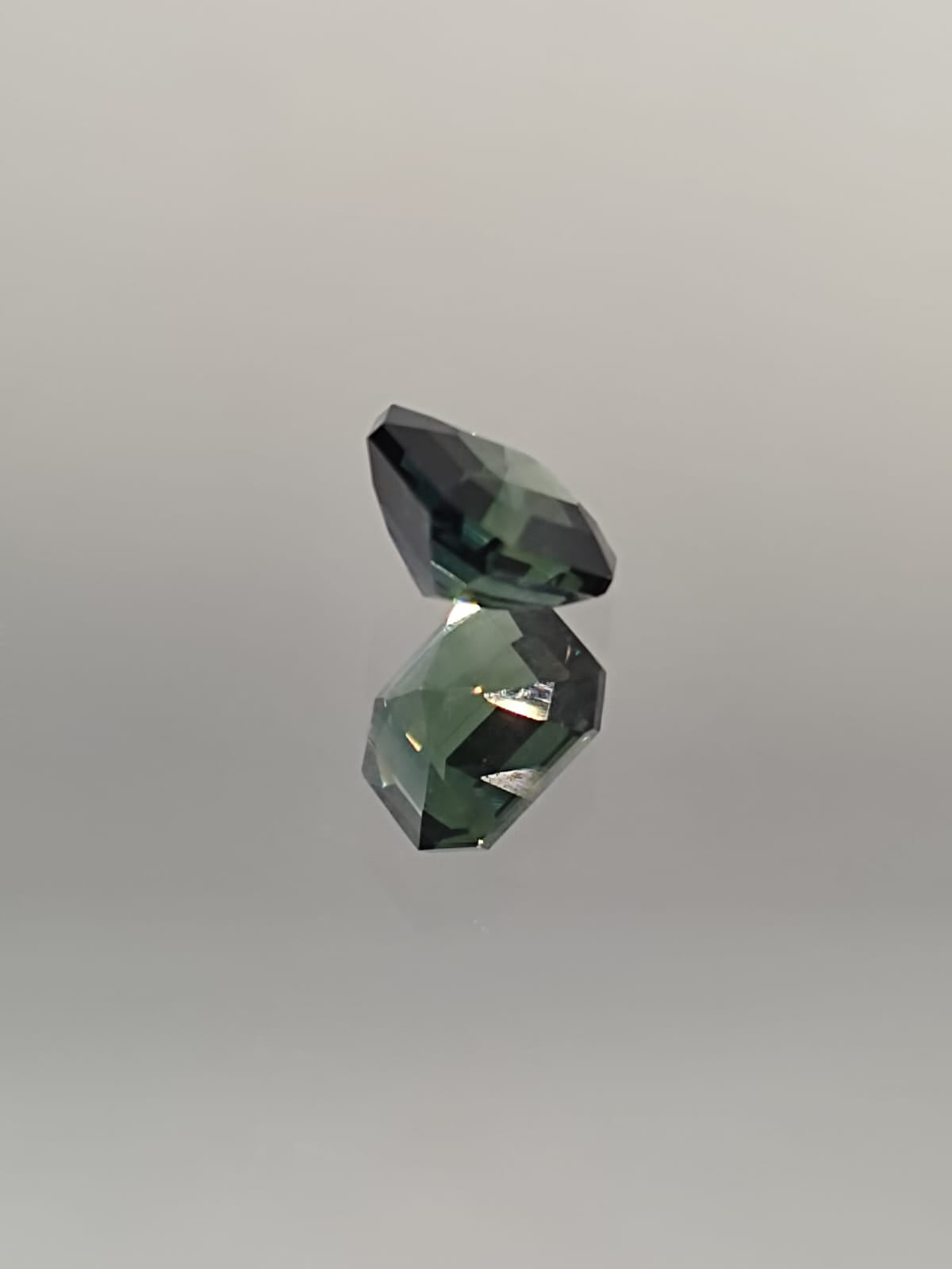 The Enchanting 1.60-Carat Teal Sapphire: A Gem of Elegance and Mystery