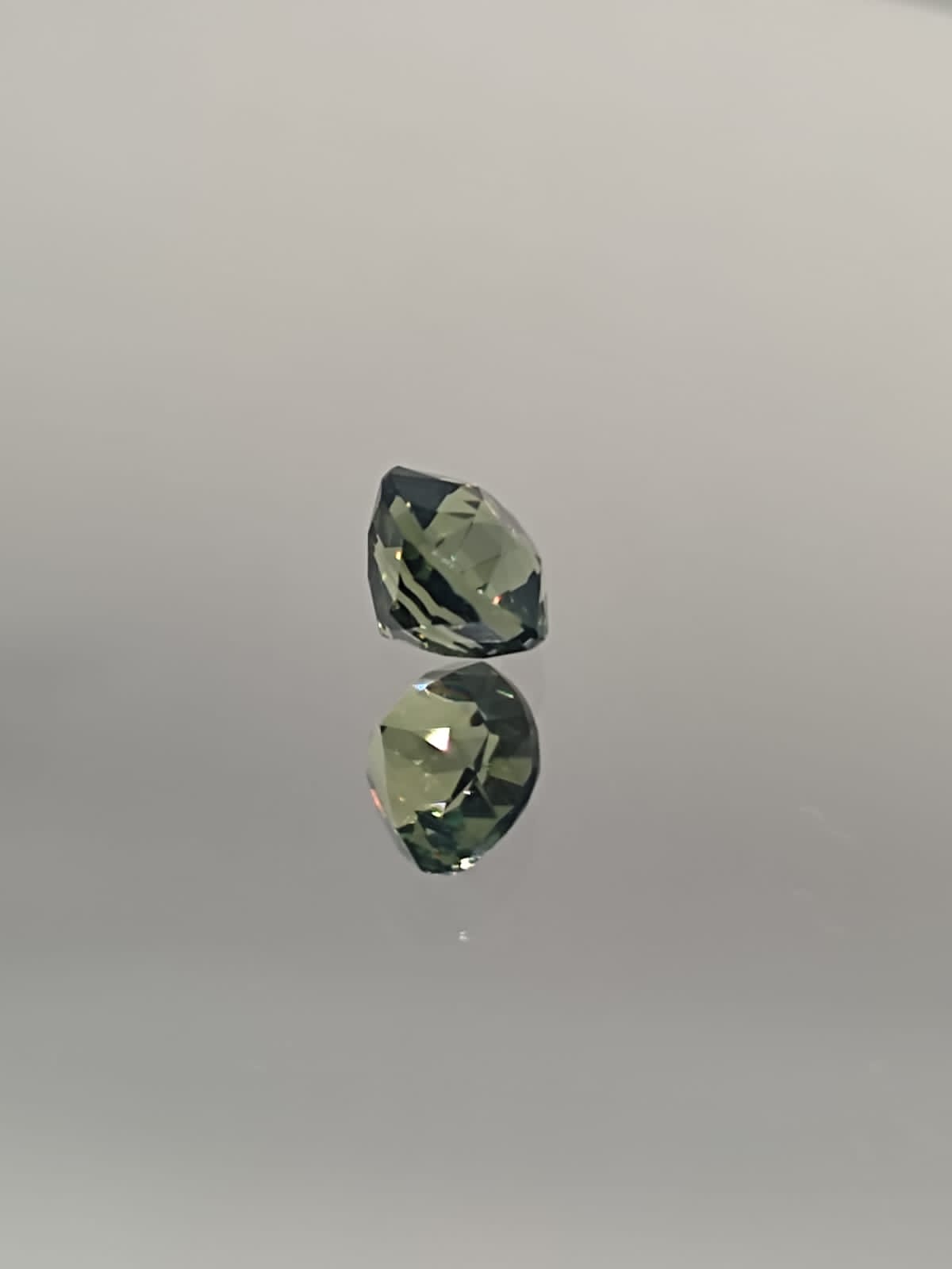 The Natural 1.58-Carat Green Sapphire: A Symbol of Renewal and Luxury