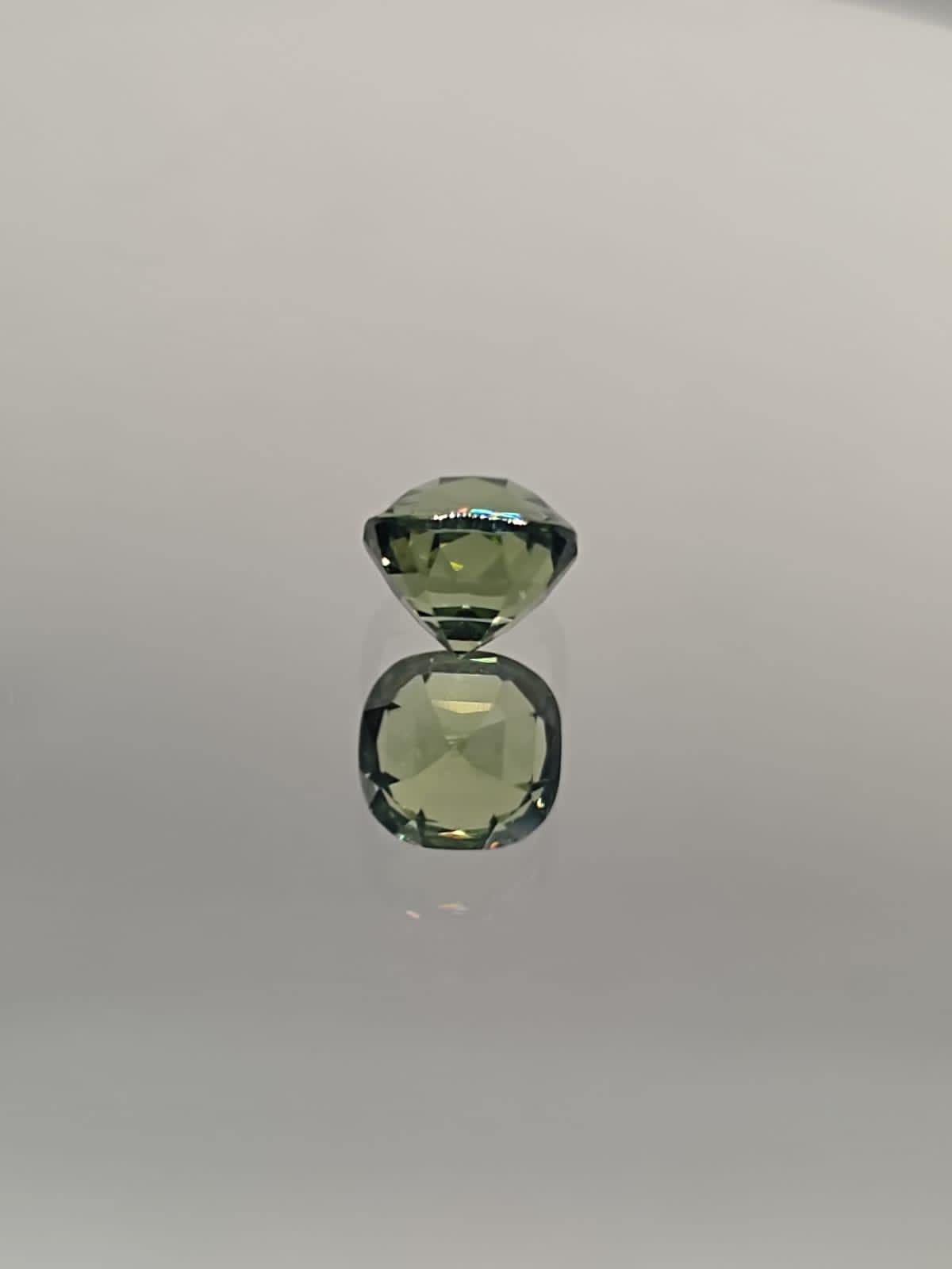 The Natural 1.58-Carat Green Sapphire: A Symbol of Renewal and Luxury