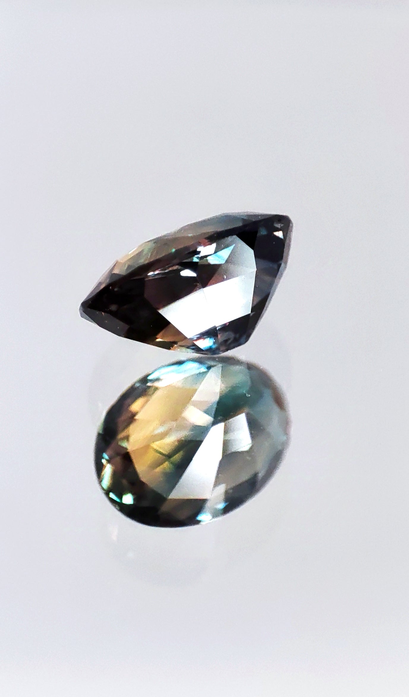 The Earth's Masterpiece: A Captivating 2.09ct Bi-Color Sapphire
