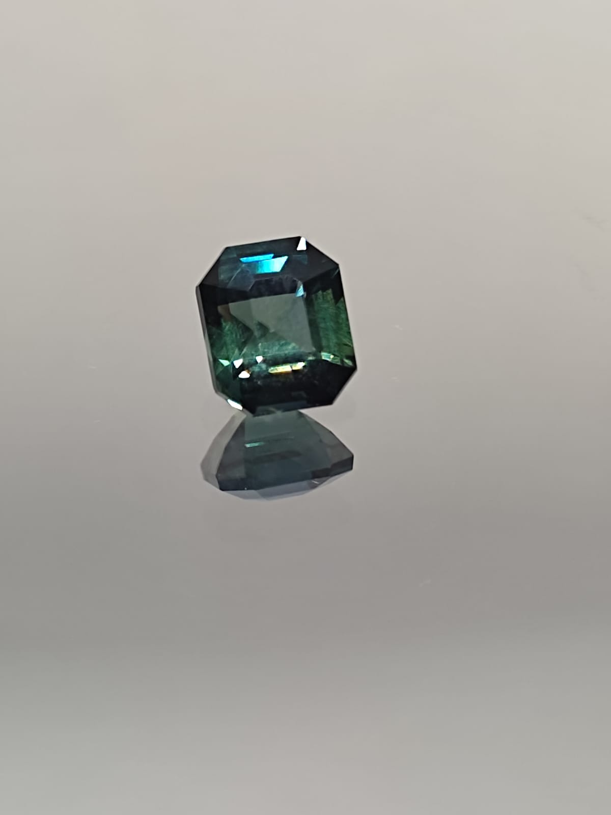 The Enchanting 1.60-Carat Teal Sapphire: A Gem of Elegance and Mystery